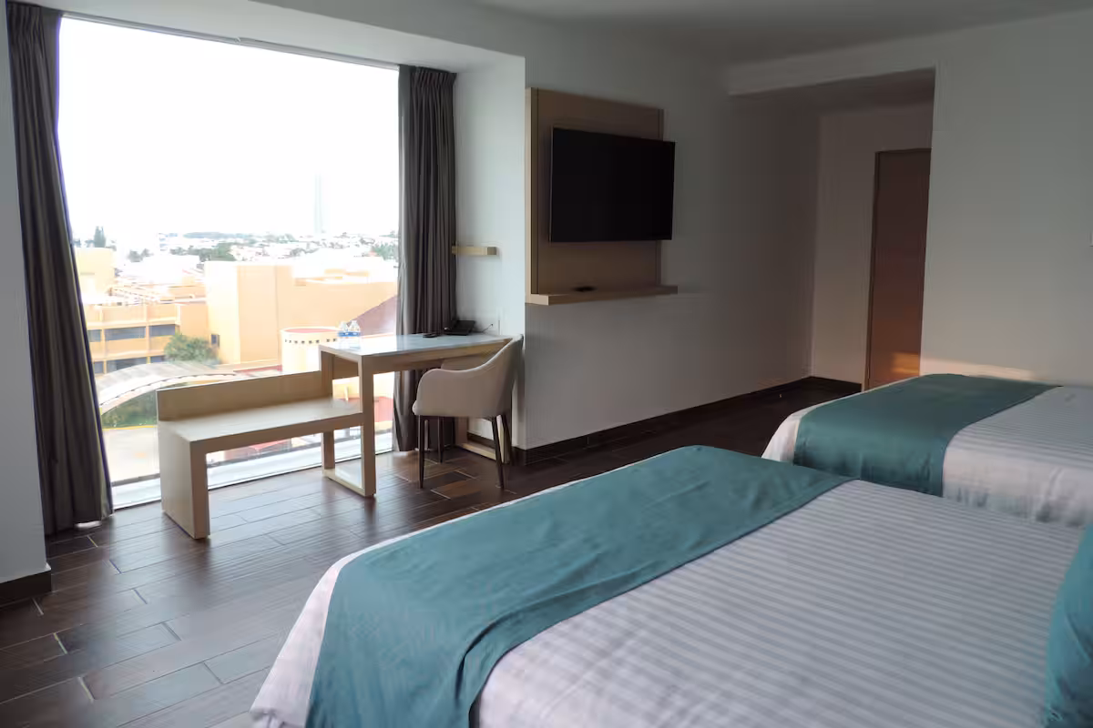 Habitación ejecutiva 2 camas queen 2 personas